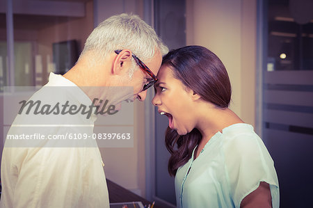 Business people quarreling in office Business people quarreling in office