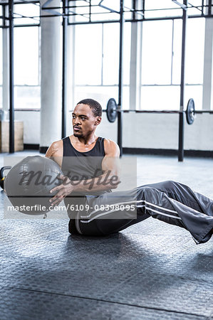 Fit man working out with ball