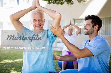 Senior couple doing exercises