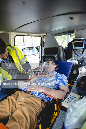Injured man with ambulance man
