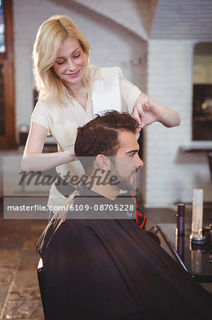 Man getting his hair trimmed at the hair salon