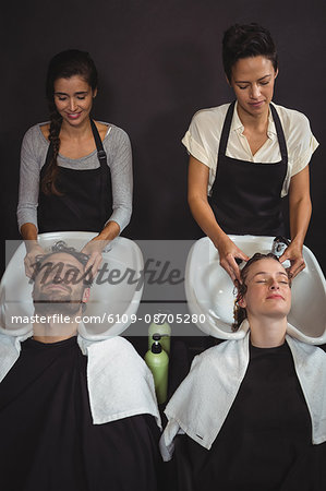 Clients getting their hair wash at the salon