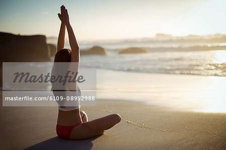 Royalty-Free photo: Yoga on beach