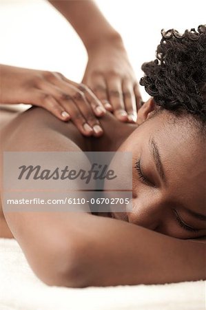 Woman Receiving Back Massage Stock Photo, Royalty-Free