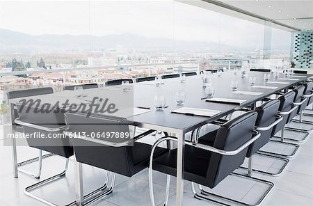 Empty conference room overlooking city