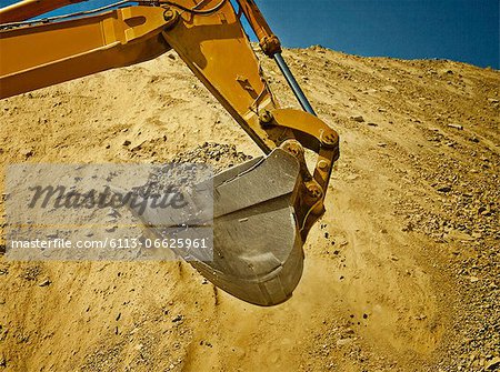 Digger working in quarry