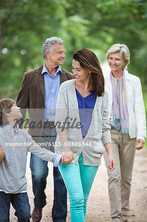 Family walking on rural road