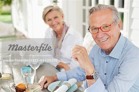 Couple smiling at table together
