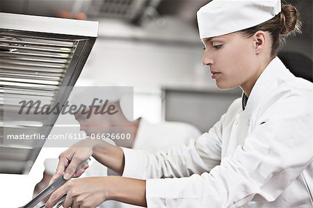 Chef cooking in restaurant kitchen