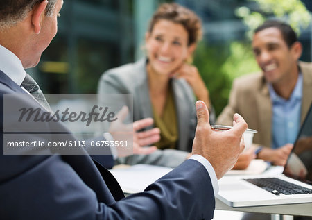 Business people talking in meeting