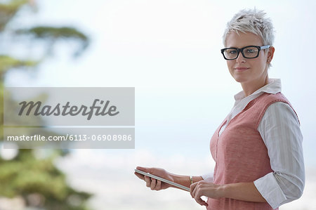 Businesswoman holding tablet computer