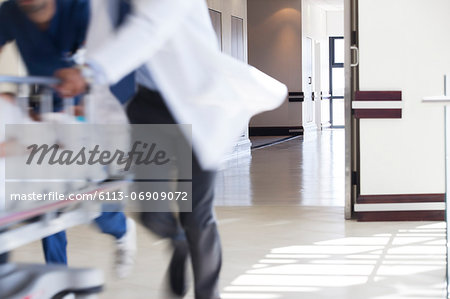 Hospital staff rushing patient to operating room