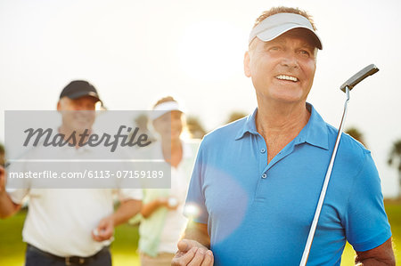 Senior adults on golf course