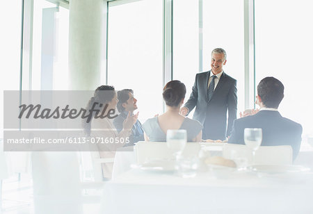 Businessman talking in restaurant Businessman talking in restaurant