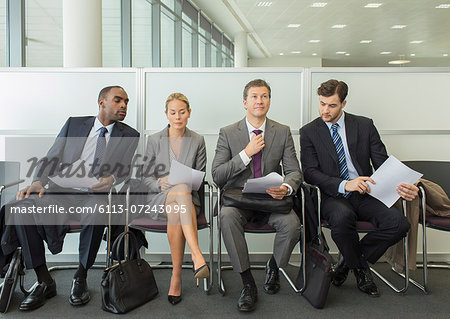 Business people sitting in waiting area