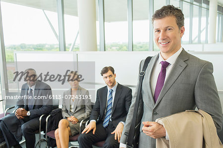 Businessman smiling in office