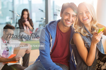University students smiling in lounge University students smiling in lounge