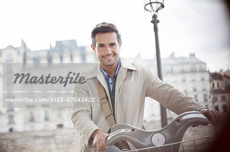 Businessman on bicycle, Paris, France