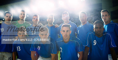 Soccer team standing in stadium