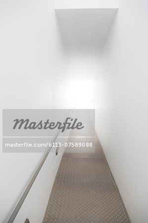 Light in doorway at end of ramp