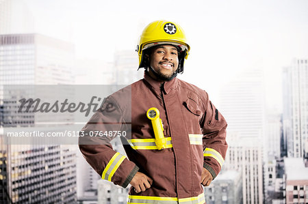 Portrait of confident fireman in urban window