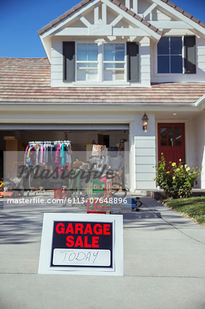 Garage Sale Sign In Driveway Stock Photo Masterfile Premium