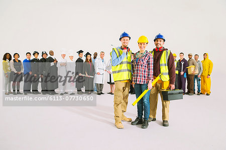 Portrait of construction workers in front of workforce