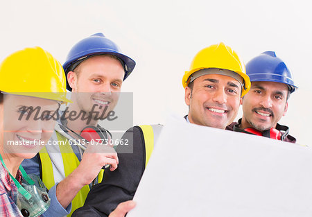Portrait of confident construction workers