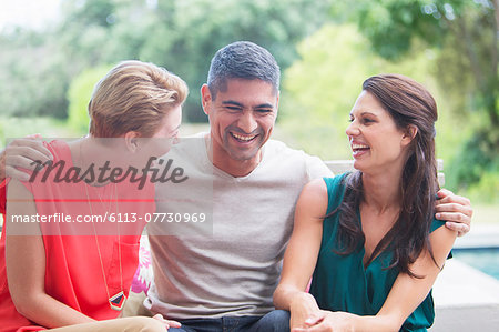 Friends relaxing together outdoors