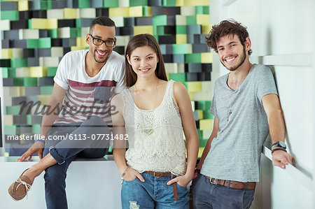 People smiling together in office