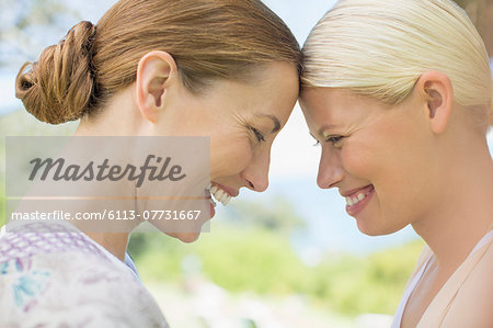 Women laughing together indoors