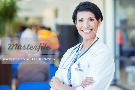 Doctor smiling outside hospital