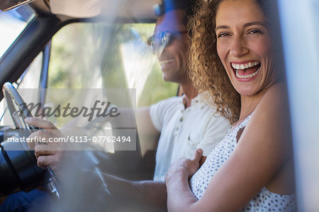 Couple riding in car together