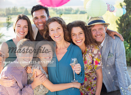Family hugging outdoors Family hugging outdoors