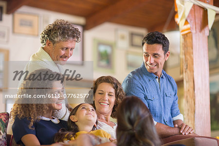 Family gathered on the couch together