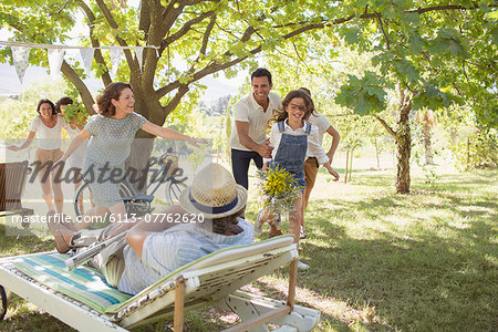 Family playing together outdoors Family playing together outdoors