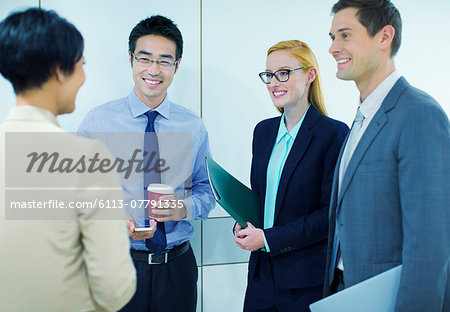 Business people talking in office building