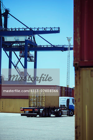 Truck carrying cargo container