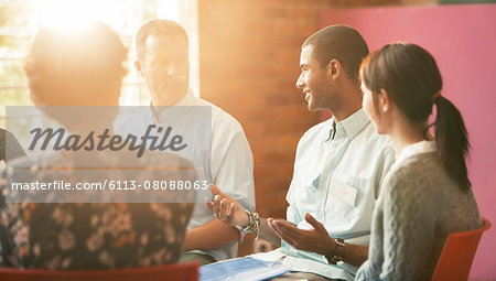 Man talking in group therapy session