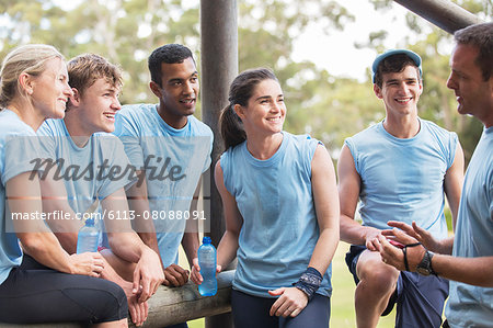 Team leader talking to teammates at boot camp