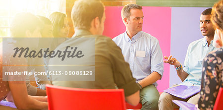 Man speaking in group therapy session