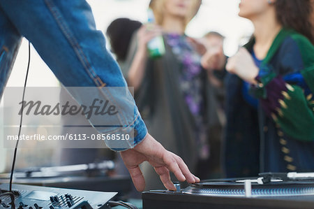 DJ spinning records at party