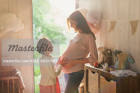 Touching Photo of Pregnancy Moments Young Expectant Mother with