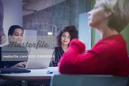 Business people listening, working in conference room meeting