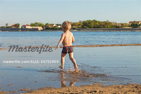 Croatia, Dalmatia, Little Boy Playing on Beach