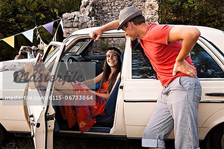 Croatia, Dalmatia, Woman in Hippie Look talking to man