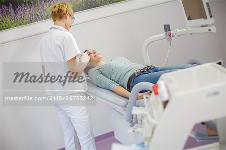 Woman Getting A Botox Injection On Her Face