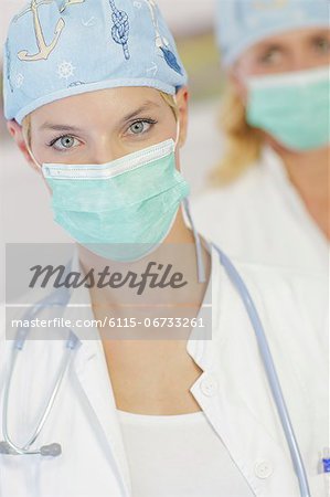 Doctor and Nurse Wearing Surgical Masks