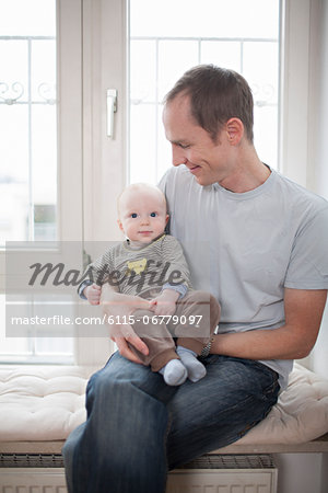 Young father with baby boy, Munich, Bavaria, Germany