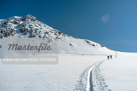 Two people back country skiing, European Alps, Tyrol, Austria